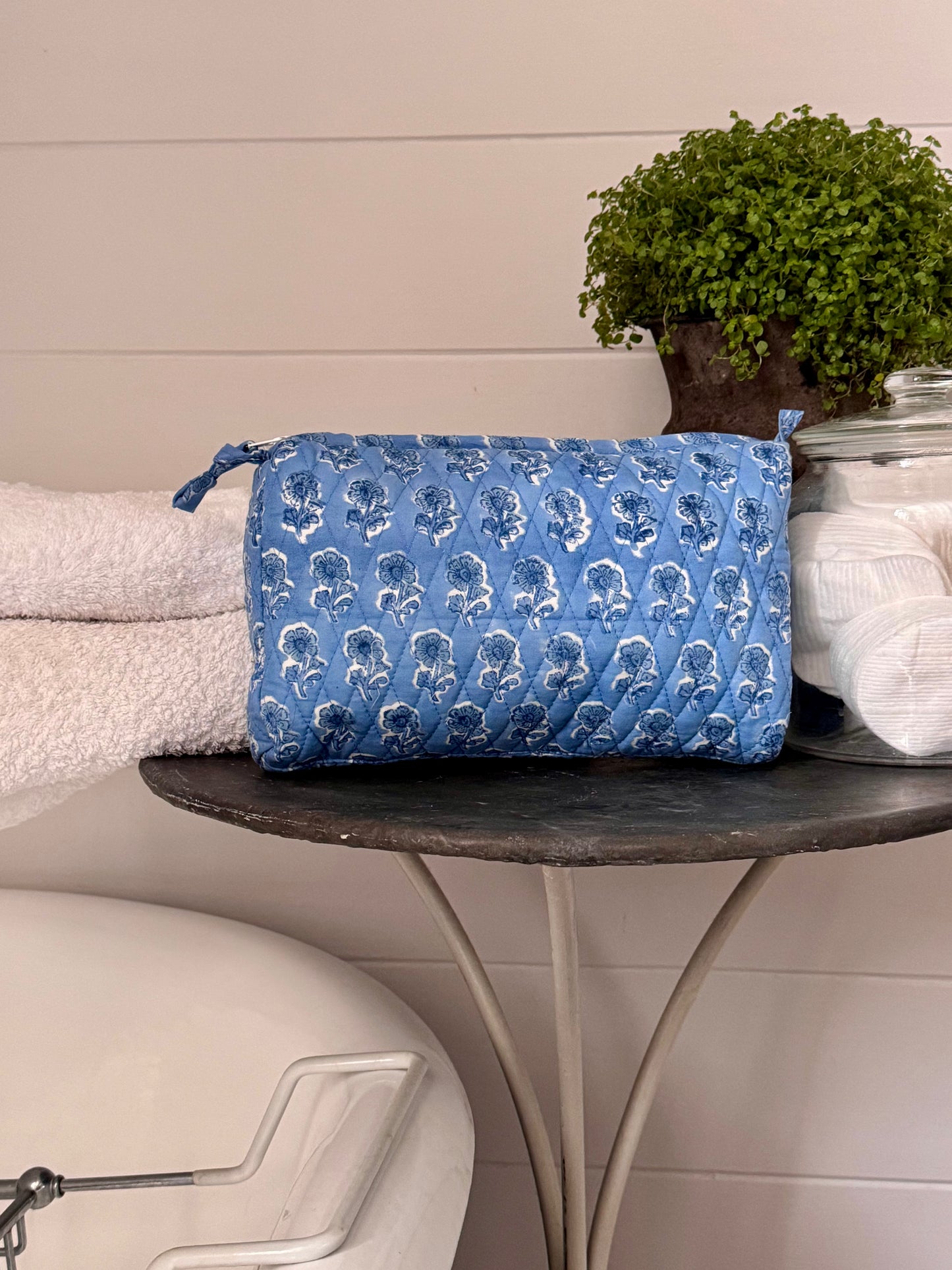 BLUE BACKGROUND FLORAL MAKEUP BAG