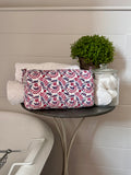 RASPBERRY AND BLUE REVERSE FLORAL MAKEUP BAG
