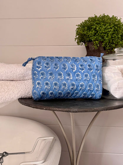 BLUE BACKGROUND FLORAL MAKEUP BAG