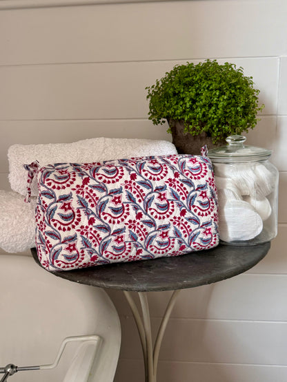RASPBERRY AND BLUE REVERSE FLORAL MAKEUP BAG