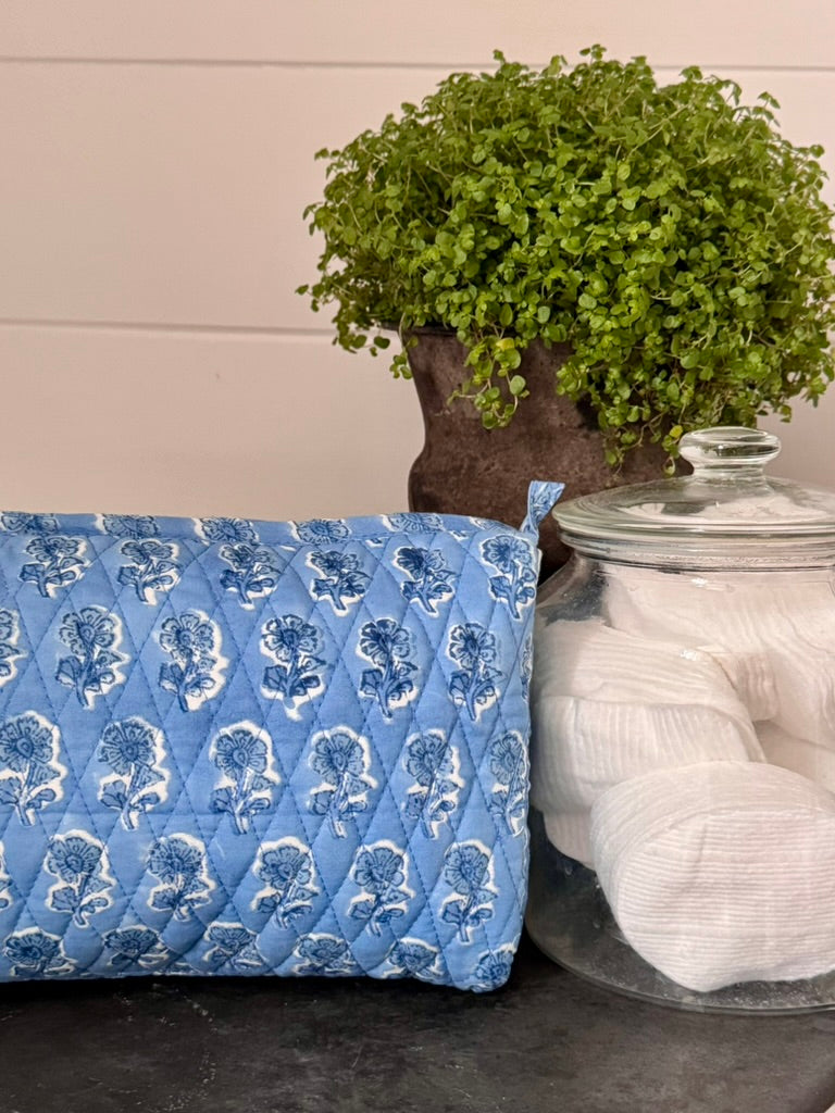 BLUE BACKGROUND FLORAL MAKEUP BAG